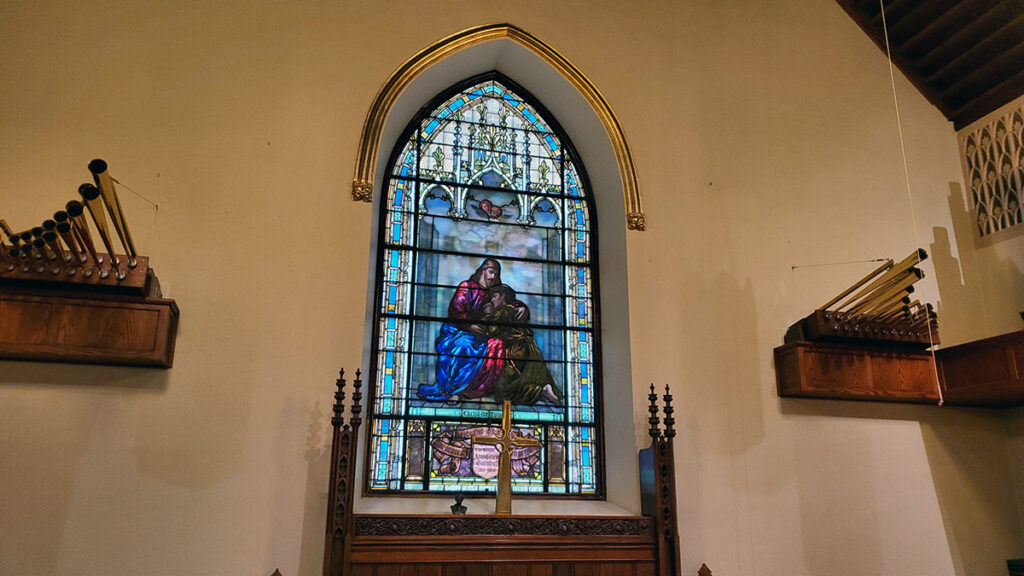 Christ the Consoler stained glass window